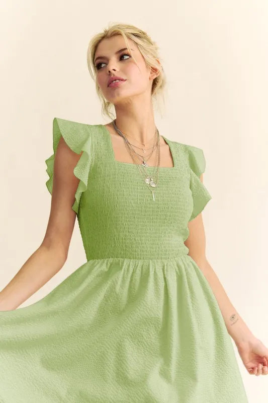 Davi & Dani Ruffled Cap Sleeve Smocked Mini Dress.